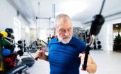 Senior male working out at the gym