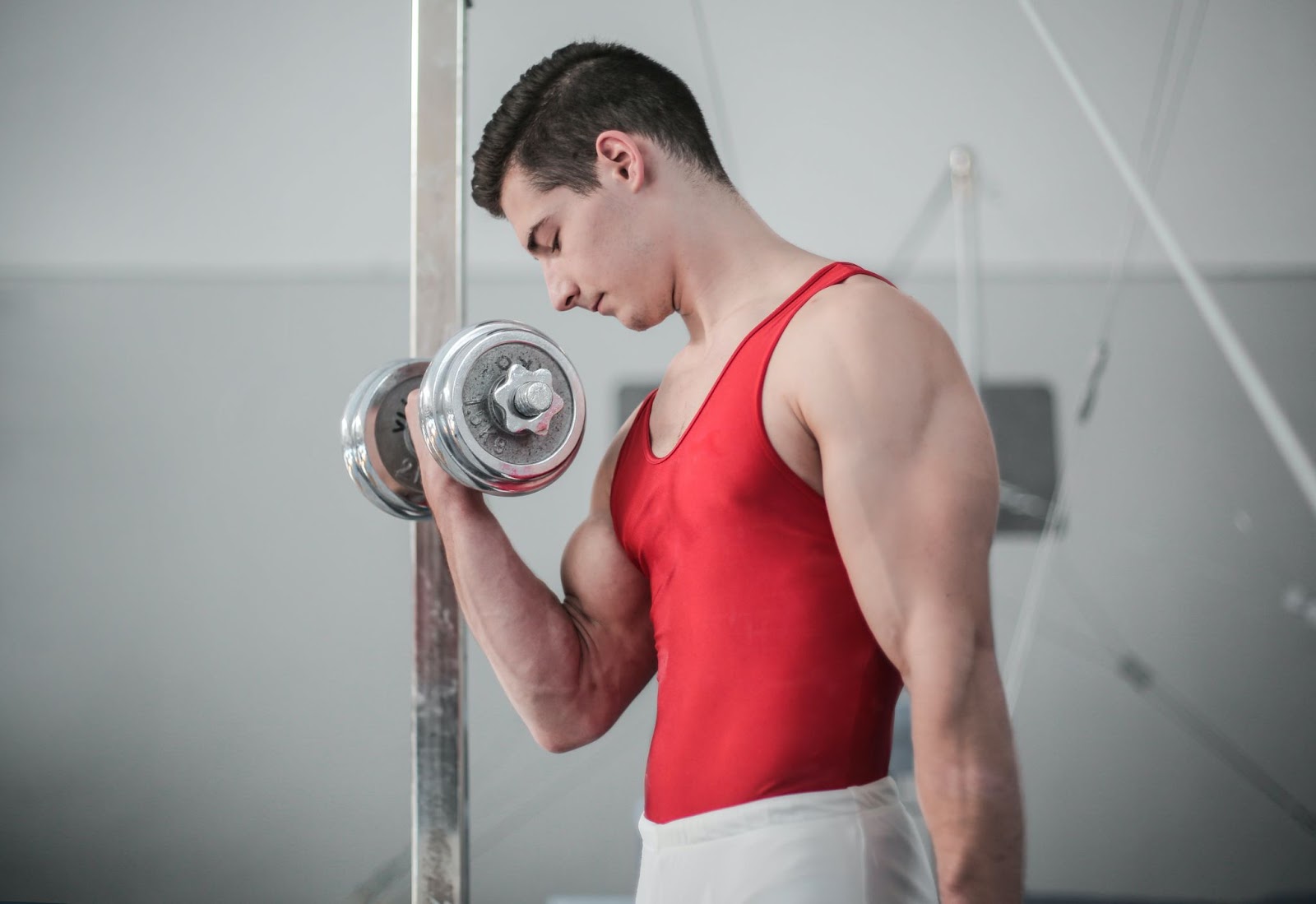 Man in a red shirt exercising