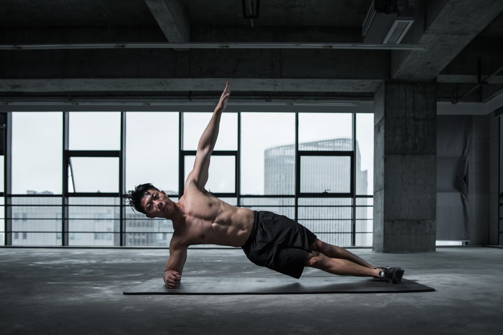 A man exercising on a yoga mat