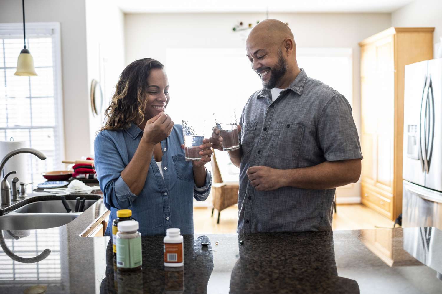 couple taking supplement together